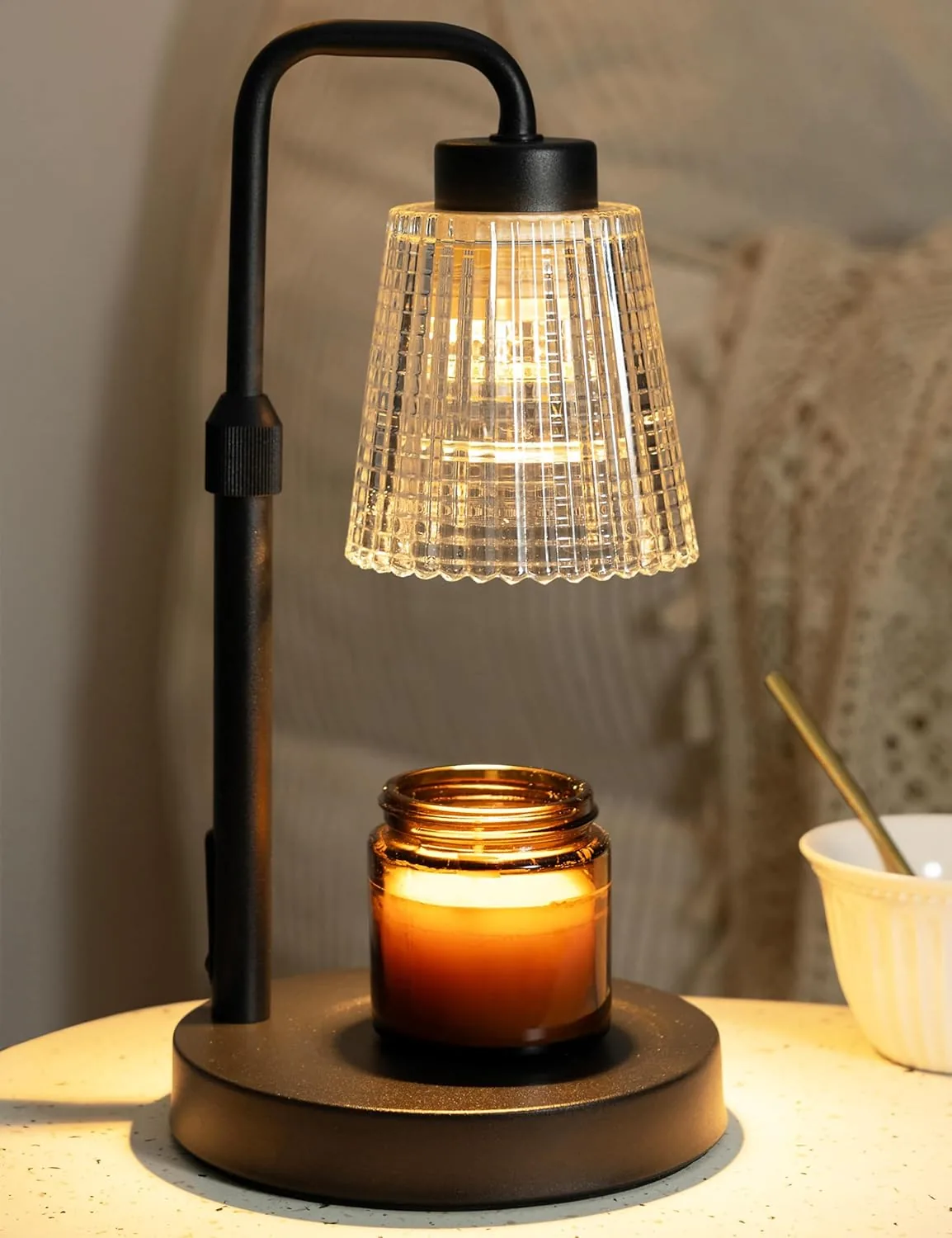 GODONLIF black candle warmer lamp with glass shade over a jar candle on a nightstand