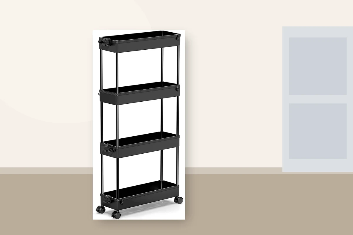 SPACEKEEPER black 4-tier slim rolling storage cart standing in a narrow kitchen gap