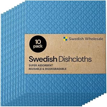 Swedish dishcloths in assorted colors spread out on a counter